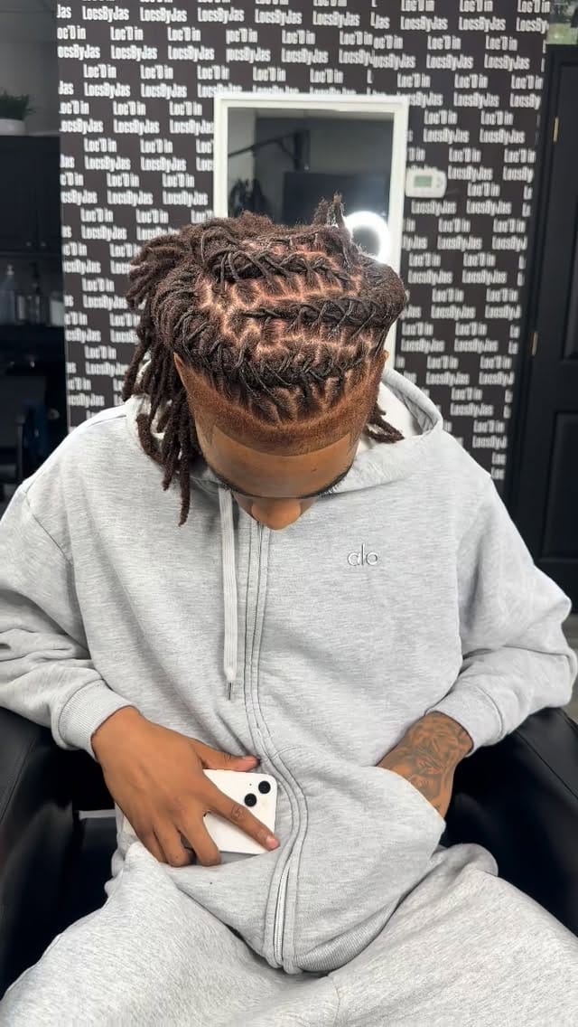Post 2 by Yo Favorite Loctician on Instagram (video)