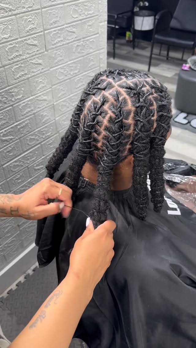 Post 7 by Yo Favorite Loctician on Instagram (video)