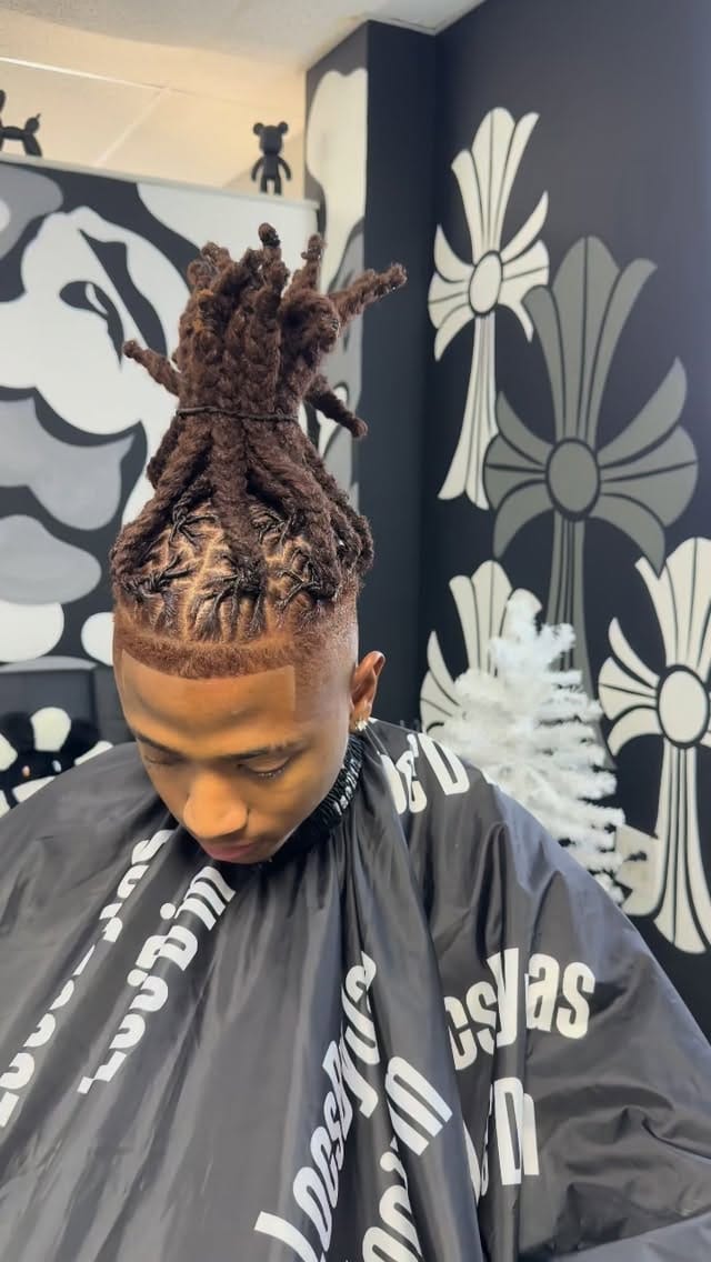 Post 3 by Yo Favorite Loctician on Instagram (video)