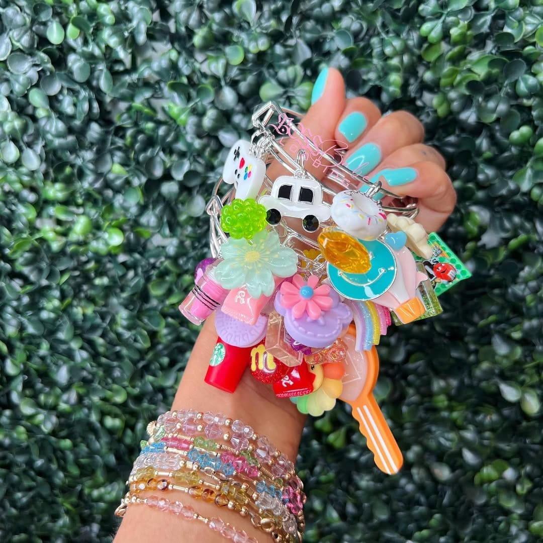Post 1 by Charm Bangles & Accessories 💖 on Instagram (carousel)