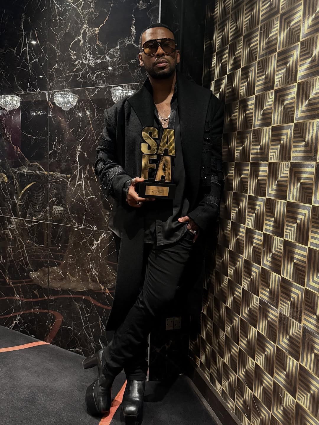Post 6 by David Tlale on Instagram (carousel)