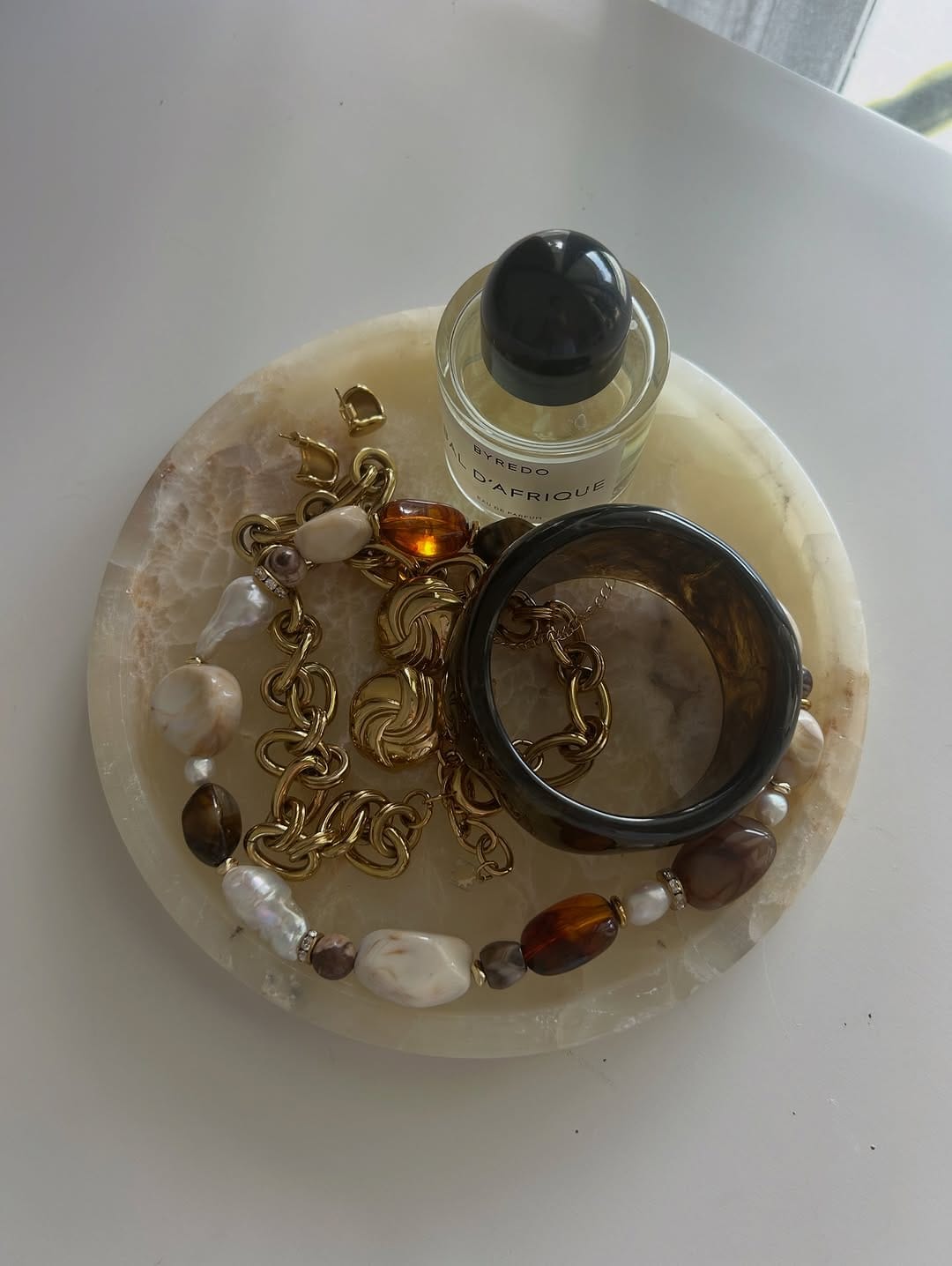 Post 2 by Cult of Sun Jewelry | Beach to bar layering jewelry on Instagram (carousel)