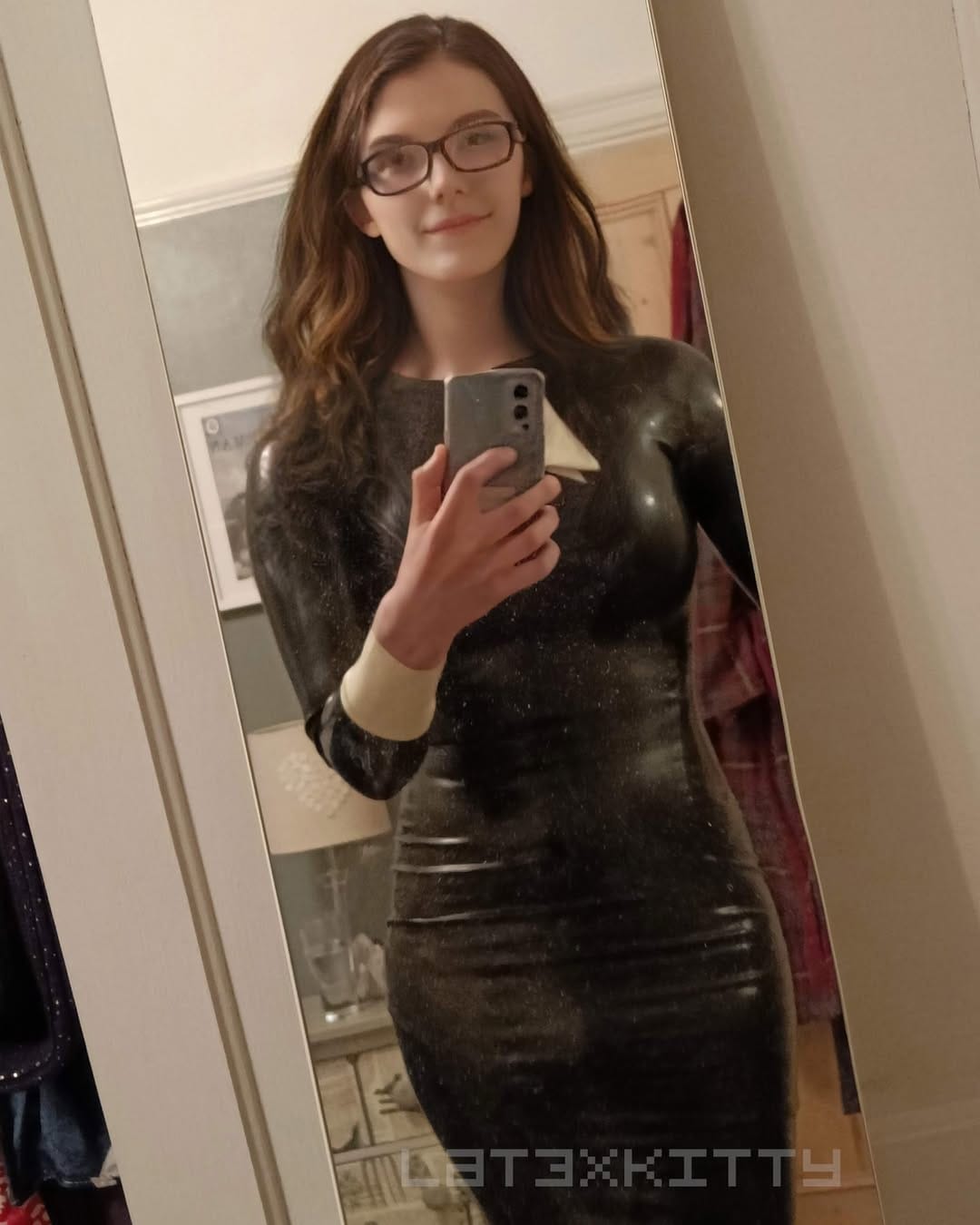 Post 10 by Latex Kitty Cass on Instagram (carousel)
