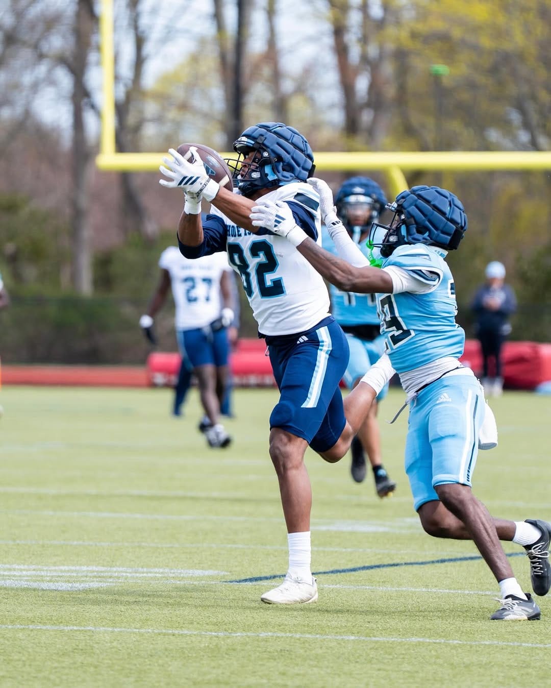 Post 8 by URI Football on Instagram (carousel)