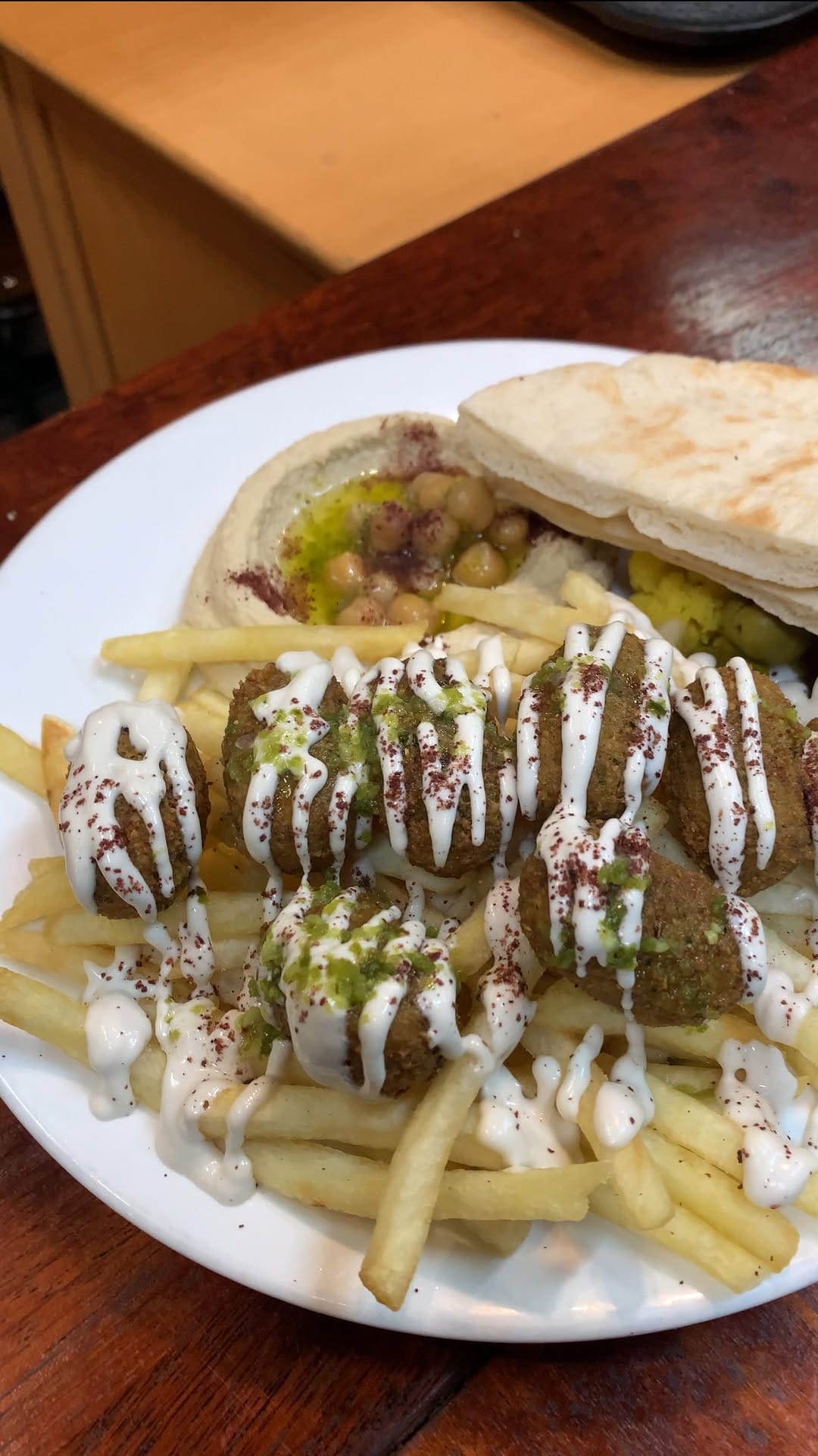 Post 8 by Wazzup Falafel on Instagram (video)