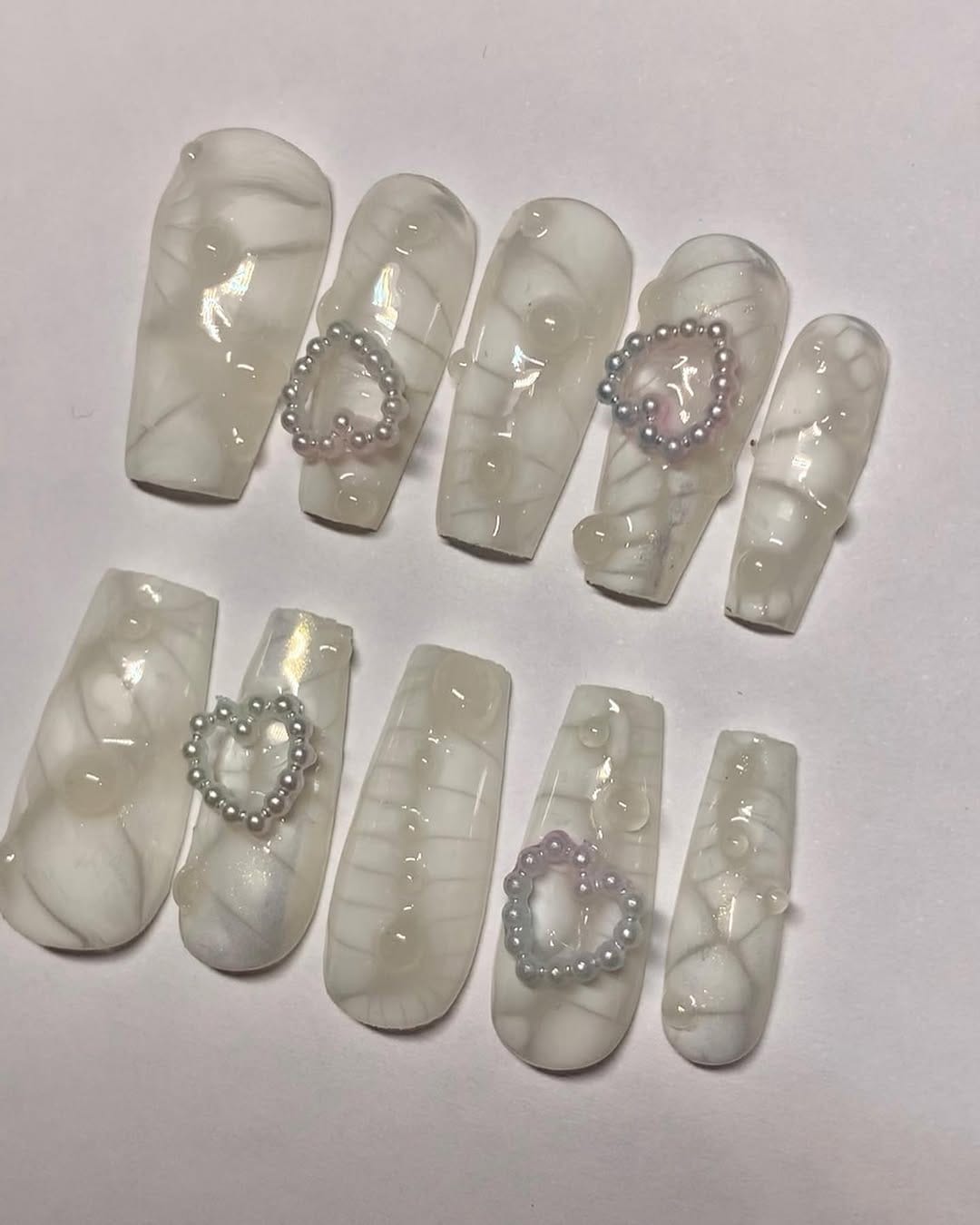 Post 9 by Hasna : Press on nails / Gel X on Instagram (carousel)