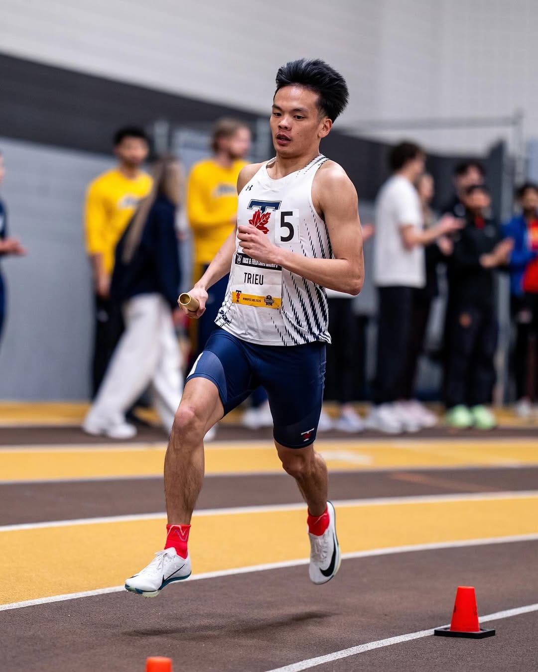 Post 8 by U of T Track & Field / Cross Country on Instagram (carousel)
