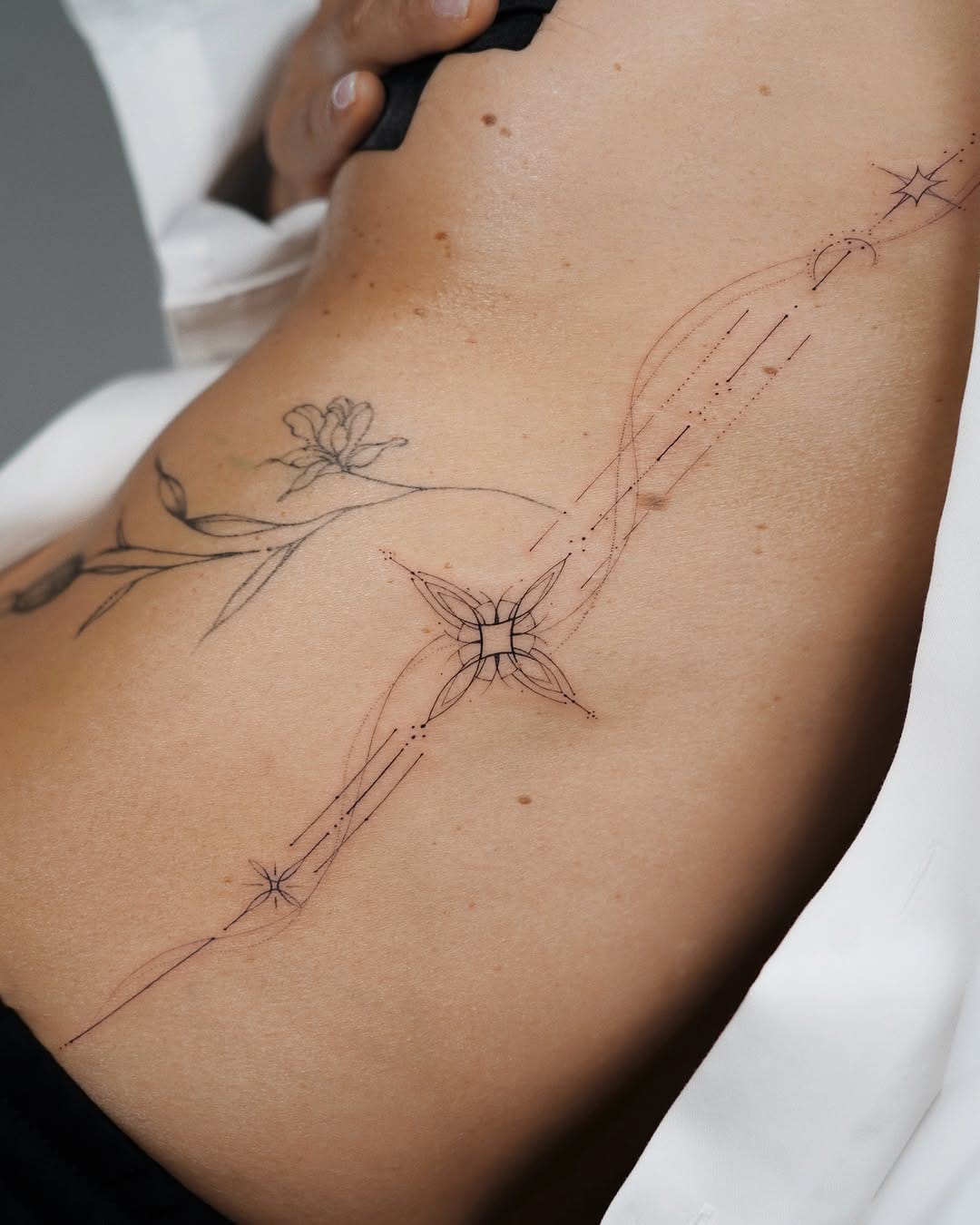 Post 1 by Kitty | Floral, fineline Tattoo Artist on Instagram (carousel)