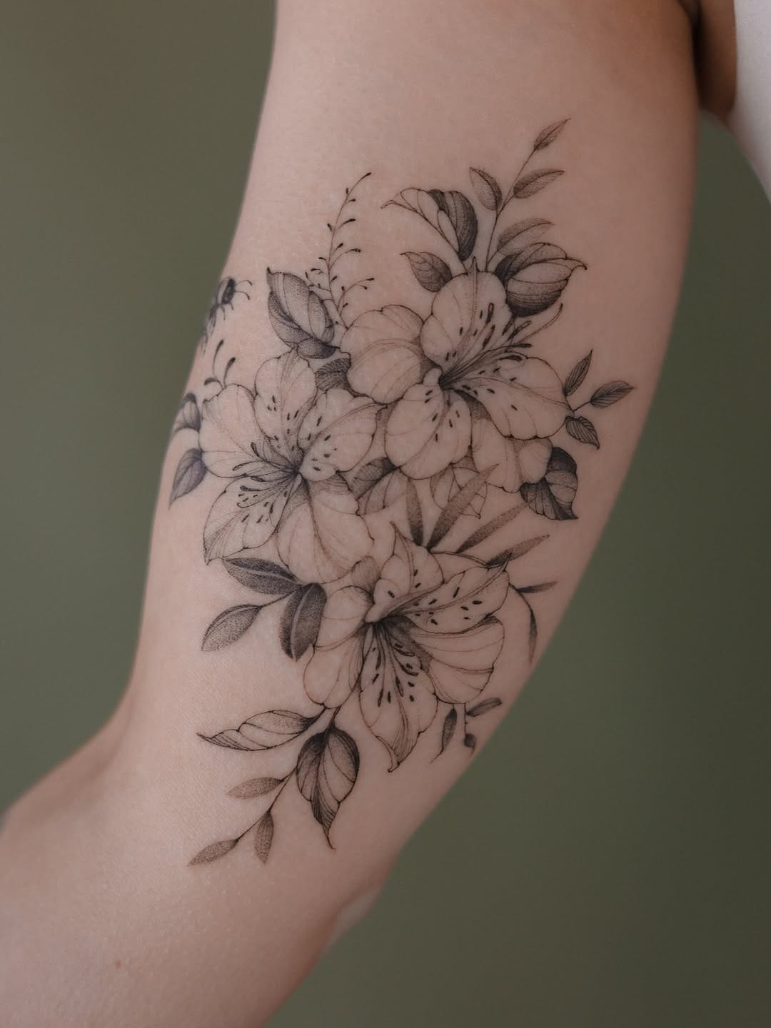 Post 1 by Irene | fineline floral tattoos 💙💛 on Instagram (carousel)