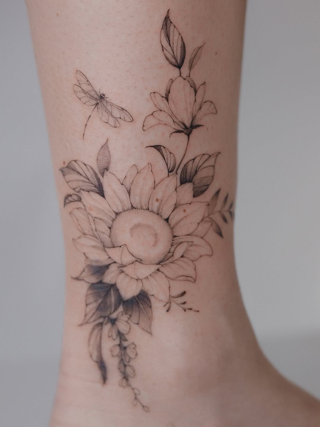 Post 5 by Irene | fineline floral tattoos 💙💛 on Instagram (carousel)