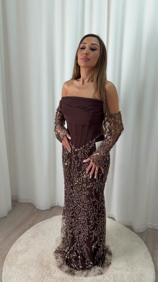 Post 2 by Noya Dresses on TikTok (video)