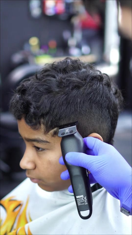 Post 6 by Rayo barber on TikTok (video)