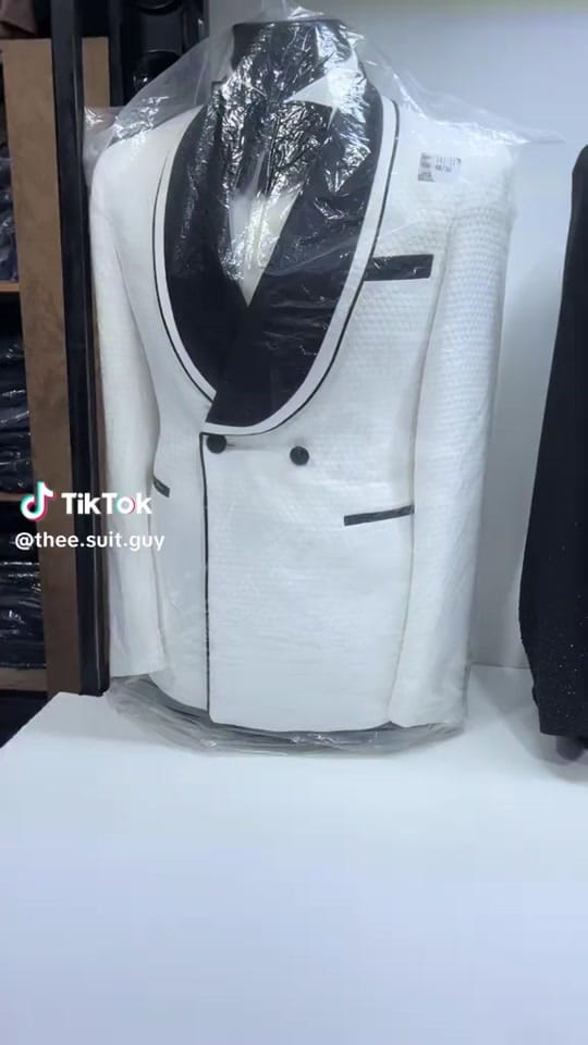 Post 1 by Nyirongo’s suit collection on TikTok (video)