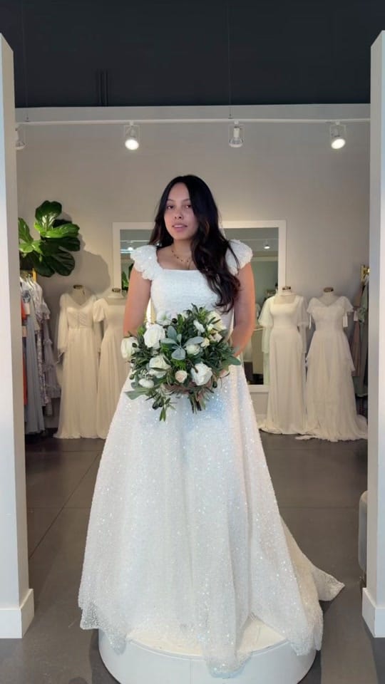 Post 5 by Moments Made Bridal on TikTok (video)