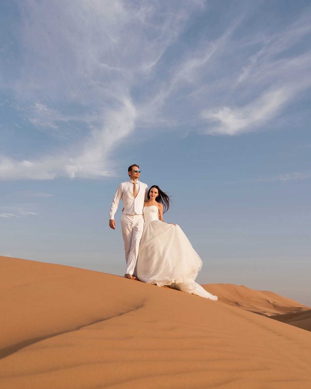Post 2 by Dubai wedding photographer on Instagram (carousel)